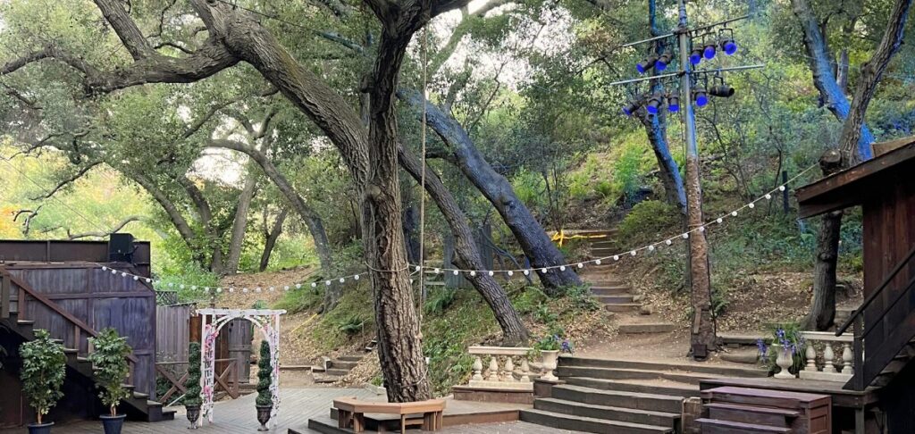 Intimate outdoor theater stage with string lights at Will Geer Theatricum Botanicum in Topanga Canyon for Waiting in the Wings production